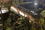 pic of bus sinking in creek