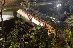 pic of bus sinking in creek