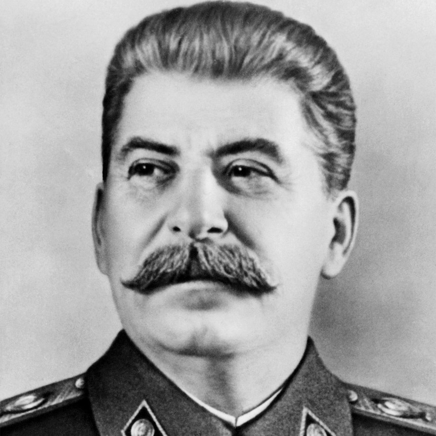 Black and while photo of Russian Communist leader, Joseph Stalin, in uniform minus hat.