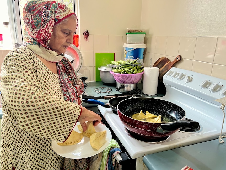 Anwar Deen preparing samosas at home