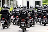 Police patrol on motorcycles in Bangkok