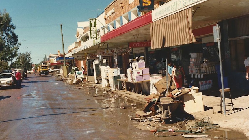 Flood-damaged businesses in main street of Charleville in 1990