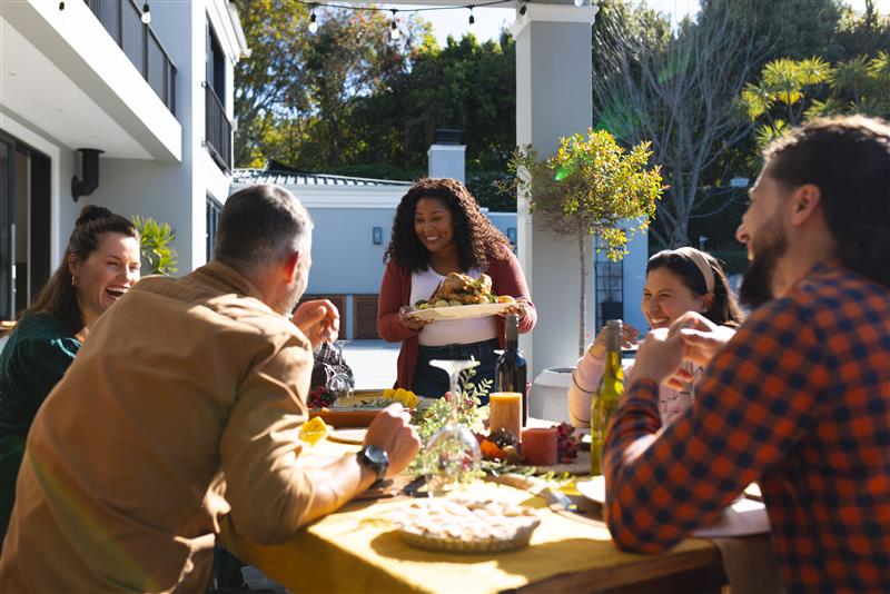 friends eating at table together