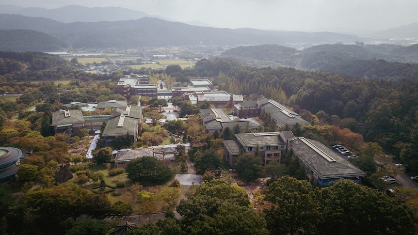 An aerial shot shows the sprawling complex being used as a residential treatment facility for COVID patients in Seoul. 