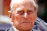 Prince Philip, the husband of Queen Elizabeth II, sits in a carriage in London