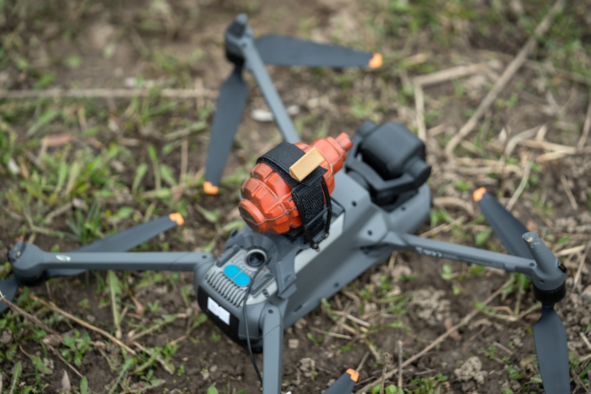 A drone with a training grenade