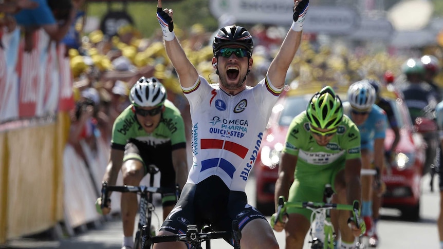 Britain's Mark Cavendish celebrates his win in stage 13 of the 2013 Tour de France on July 12, 2013.