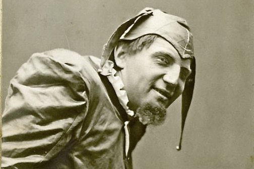 Michael Shuisky hunched over in the title role of Verdi's opera Rigoletto.