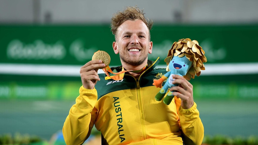 Australia's Dylan Alcott wins gold in wheelchair tennis men's quad singles at the Rio Paralympics.