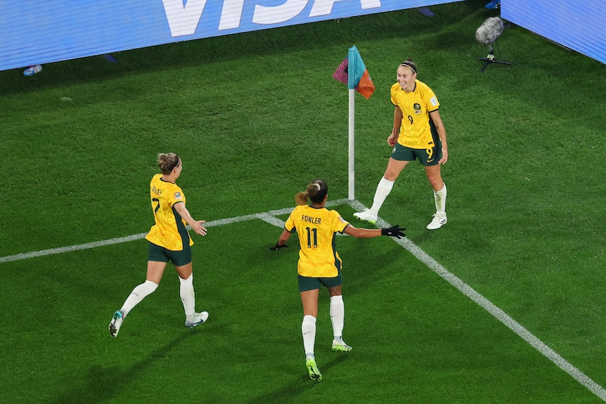 Caitlin Ford celebrates