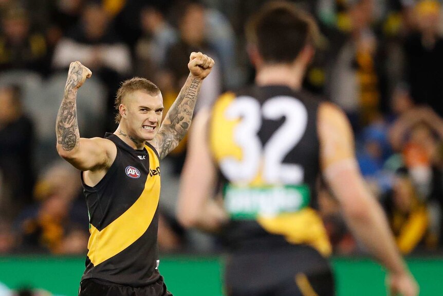 Richmond's Dustin Martin celebrates on the final siren as the Tigers beat Gold Coast at the MCG.