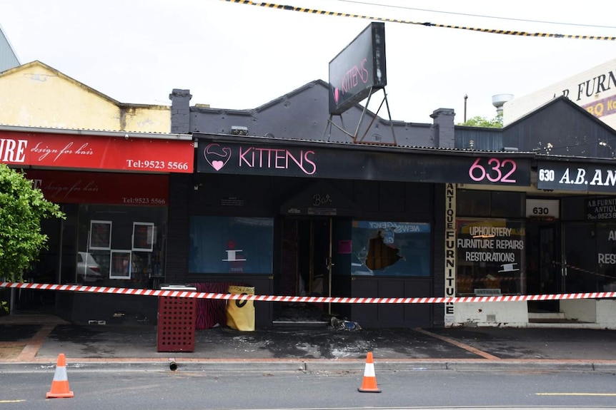 Kittens strip club, in Caulfield South, is surrounded by fire tape after being gutted by a major blaze.