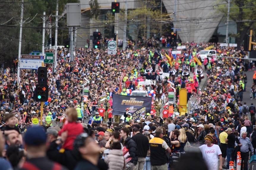 Thousands of fans in Melbourne's CBD for the AFL Grand Final parade.