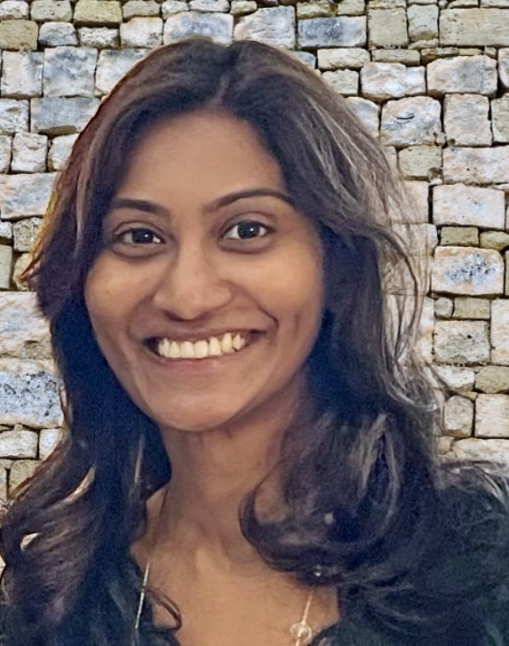 A close-up of a woman smiling