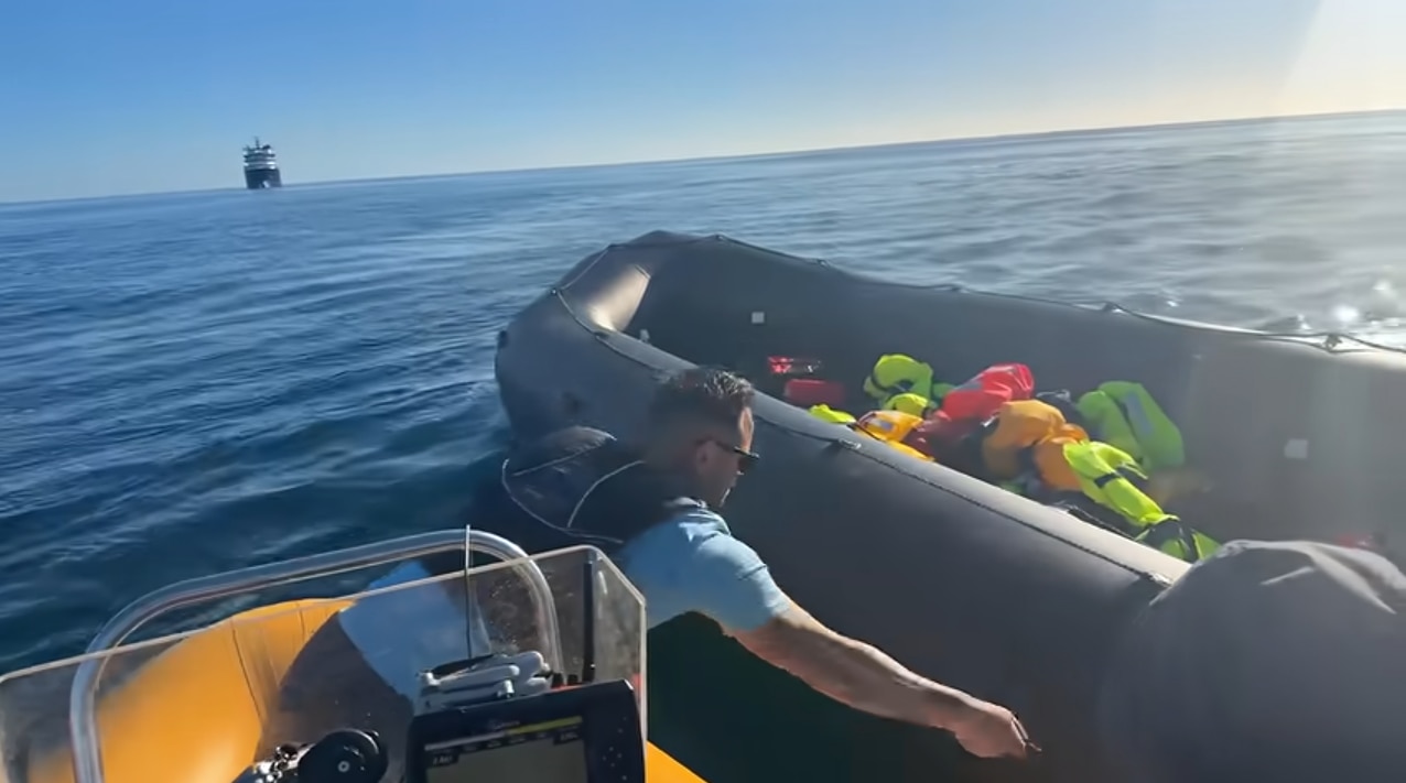Far-right UK activist arrested after 'slashing migrant boat' at sea