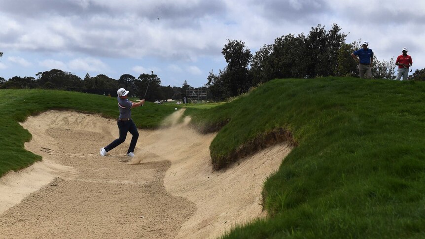 Cameron Smith plays from the bunker at the Australian Open