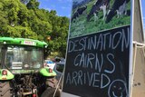 Tractor and trailer of Greg Dennis with writing announcing arrival into Cairns