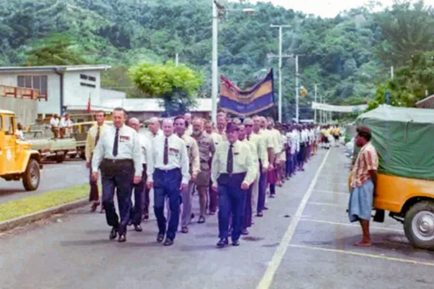 An Anzac Day parade on Mango Avenue, commemorating the town's role in both world wars. (Supplied: Rabaul Historical Society)