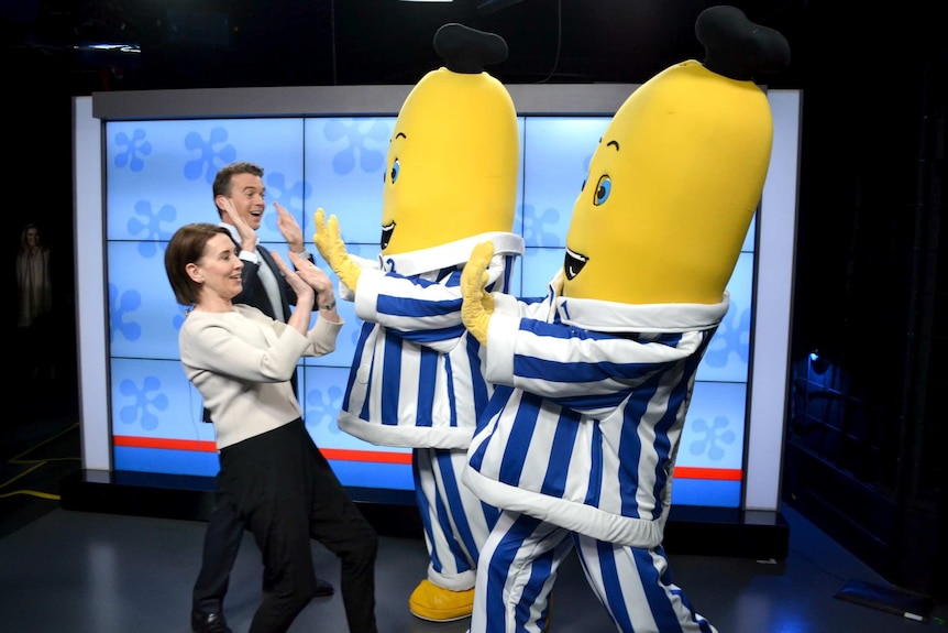 Trioli and Rowland high five the Bananas.