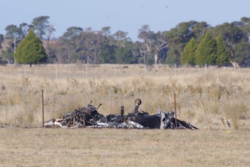Debris in a field of a small plane that crashed in Orange, New South Wales