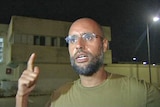 Saif al-Islam talks to journalists