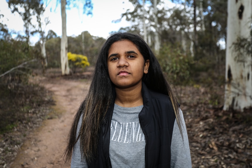 Tahrina Austin standing in the bush in Greater Bendigo National Park.