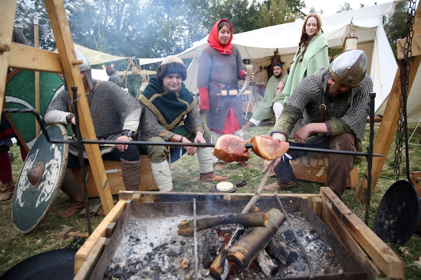 Re-enactors dress in historical costume