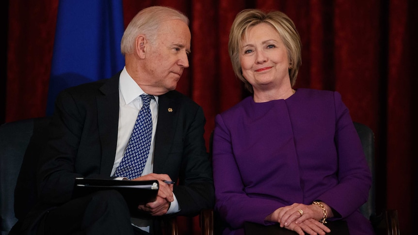 Vice President Joe Biden, left, talks with former Secretary of State Hillary Clinton.