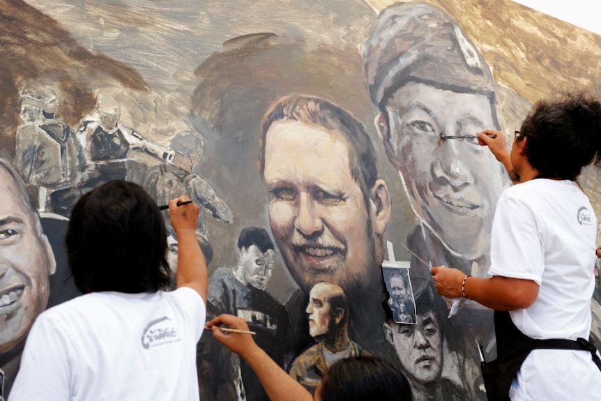 A portrait of Saman Gunan is painted in Chiang Rai