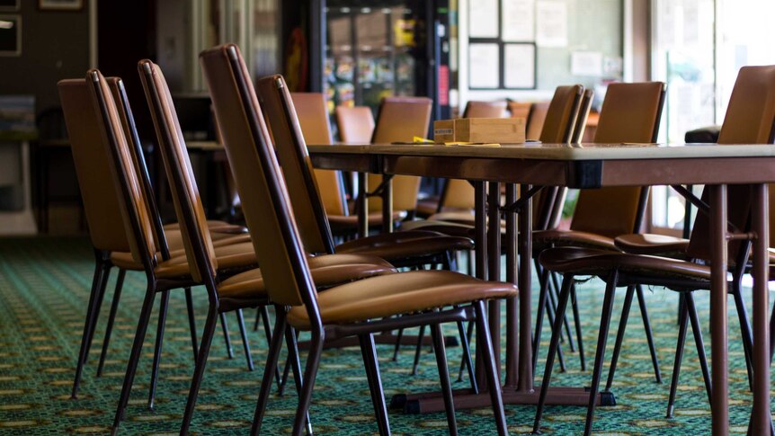 Retro-looking chairs and carpet inside the Sunnybank Bowls Club.