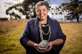 Dr Emma Lee with abalone shells.