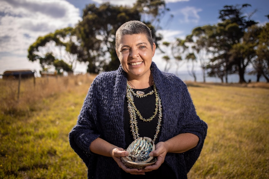 Dr Emma Lee with abalone shells.