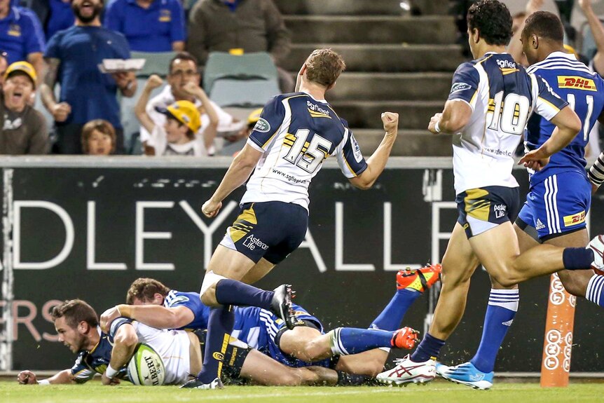 Robbie Coleman scores for the Brumbies during their 25-15 win over the Stormers at Canberra Stadium.