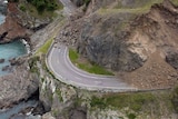 A landslide covers a section of state highway 1 near Kaikoura, New Zealand after a powerful earthquake.