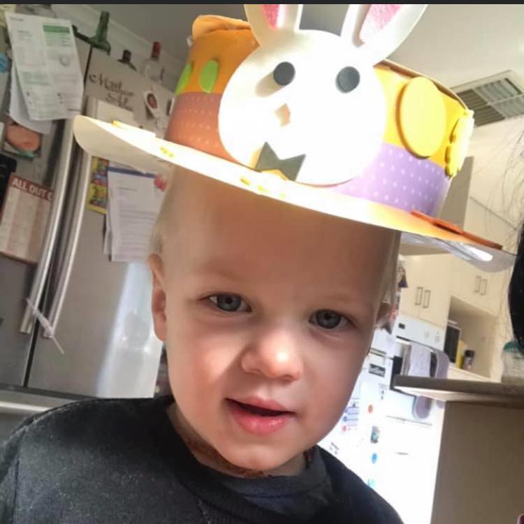 2 year old cute child with Easter hat on. 