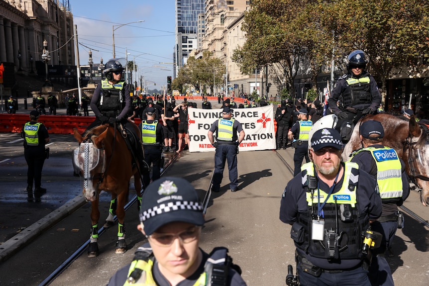 Neo-nazis and police at anti-immigration rally in Melbourne