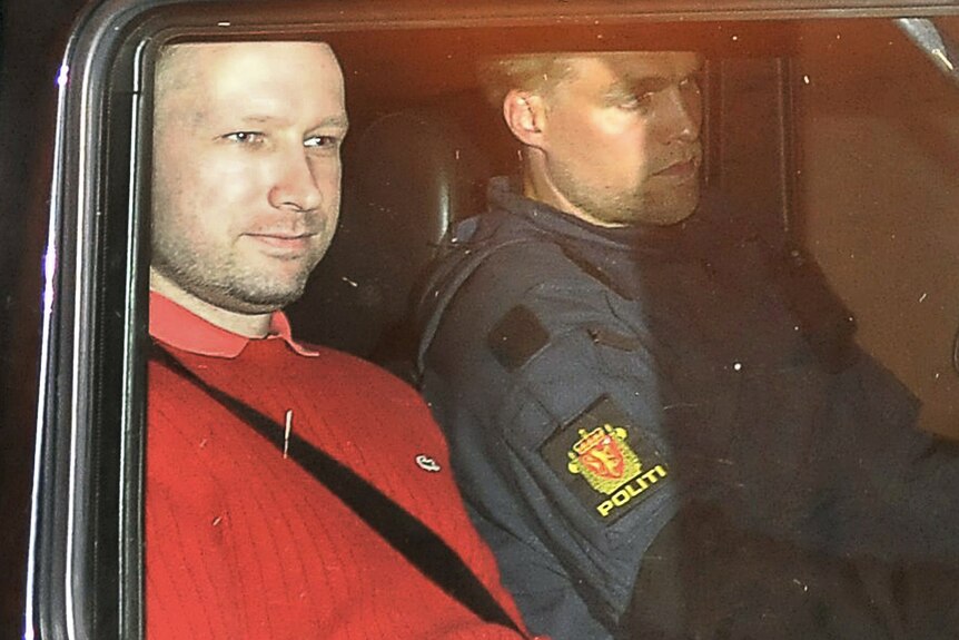 Anders Behring Breivik leaves an Oslo court in a police car after a closed-door hearing.