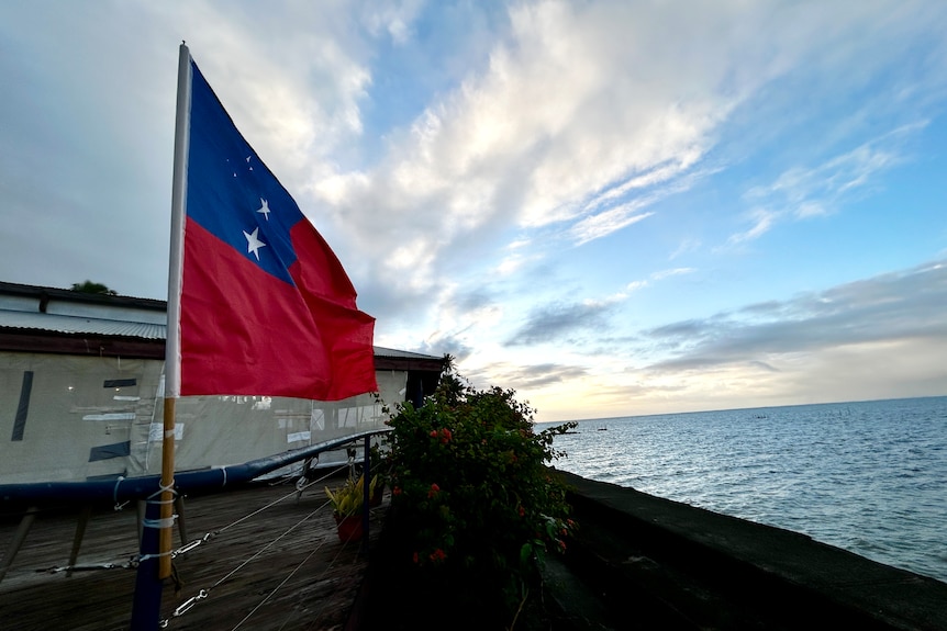 The Samoan flag by the sea. 