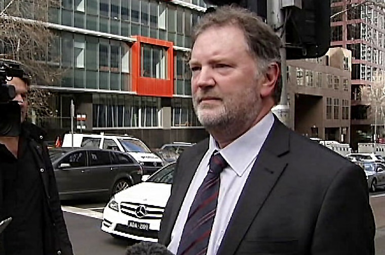 Rob Stary walks outside a Melbourne court.