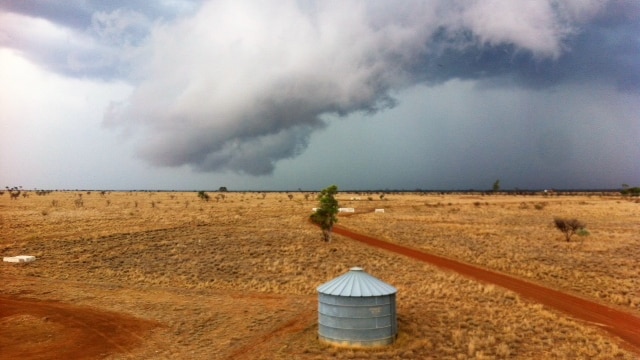 A storm rolls in over a property in western Queensland.