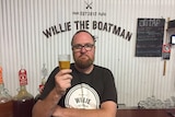 Pat McInerney stands in the willie the boatman brewery which he co-owns