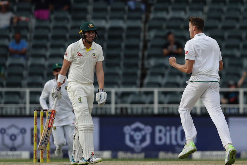 Matt Renshaw walks past a fist-pumping Morne Morkel.