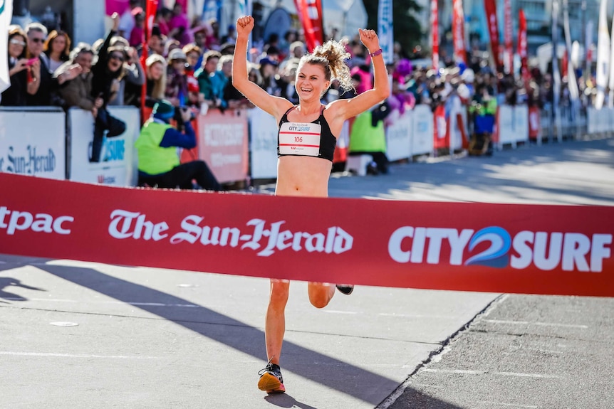 Celia Sullohern crosses the line at City2Surf