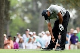 Woods shows his frustration