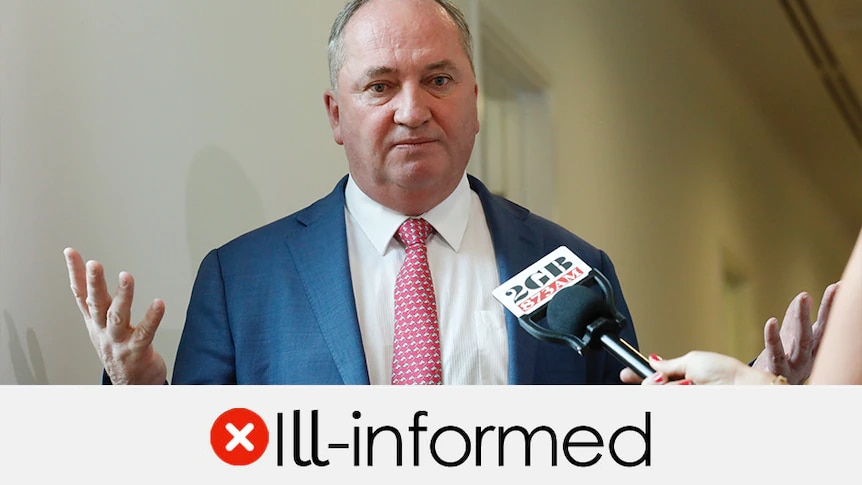 Barnaby Joyce, wearing a blue suit, with a picture frame saying "ill-informed"