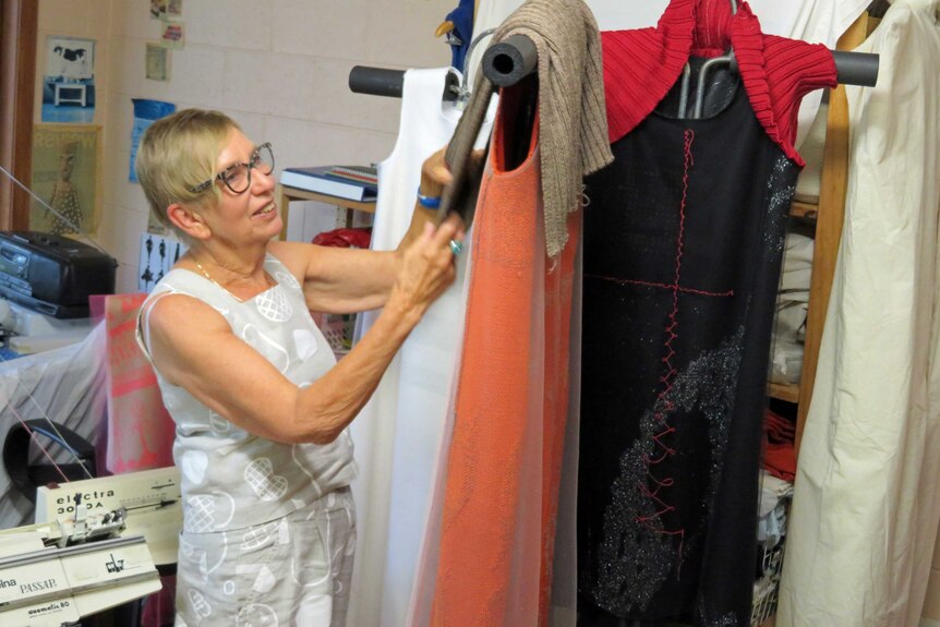 Jan Dineen looking at dresses.jpg