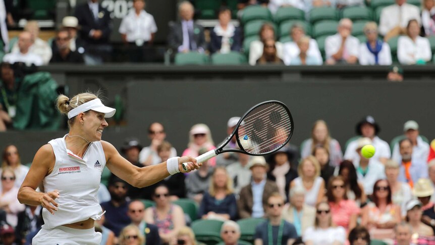 Angelique Kerber returns the ball to Daria Kasatkina at Wimbledon
