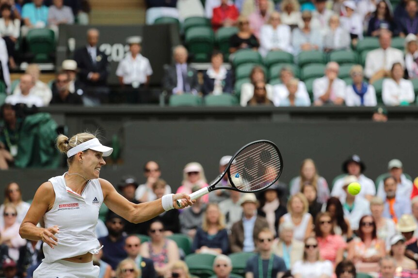 Angelique Kerber returns the ball to Daria Kasatkina at Wimbledon