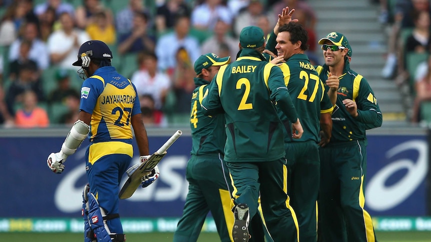 Key dismissal ... Clint McKay is congratulated by team-mates after claiming the wicket of Mahela Jayawardene