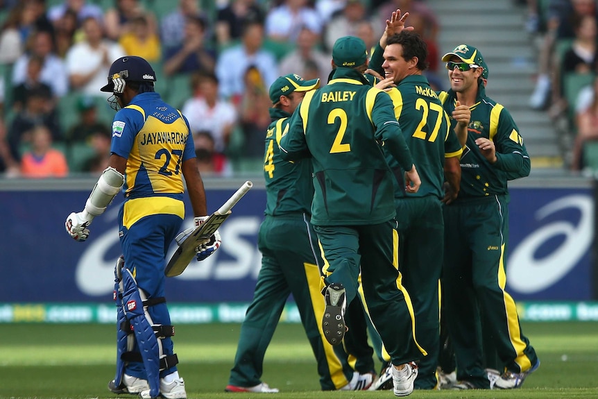 Key dismissal ... Clint McKay is congratulated by team-mates after claiming the wicket of Mahela Jayawardene
